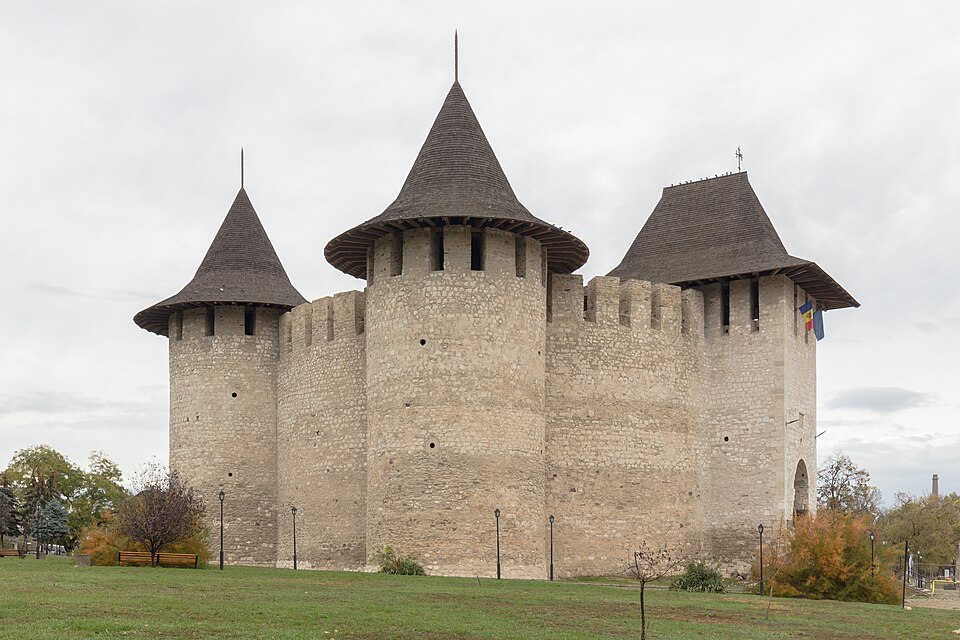 Stone walls and three conical-roofed towers of Soroca Fortress on the Dniester